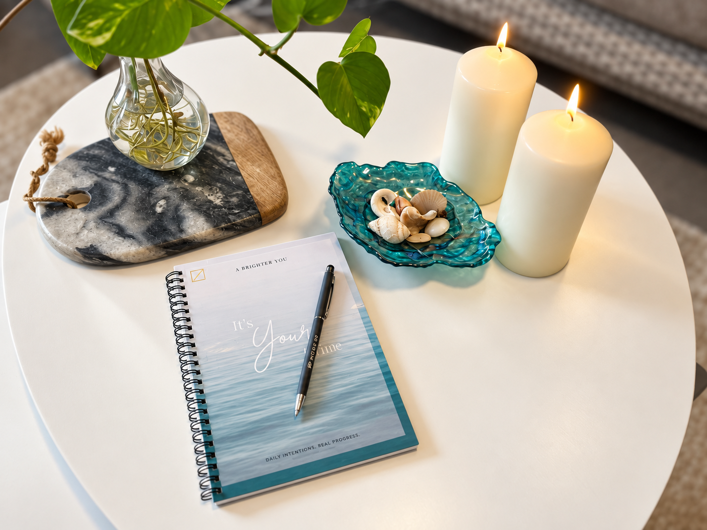 A Views career-development workbook beside candles and greenery